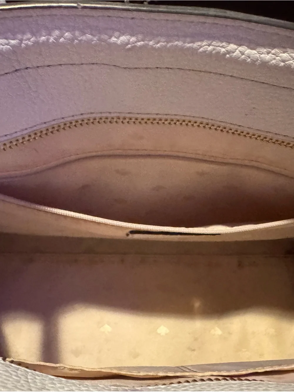 kate spade cream perforated leather tote with tassel